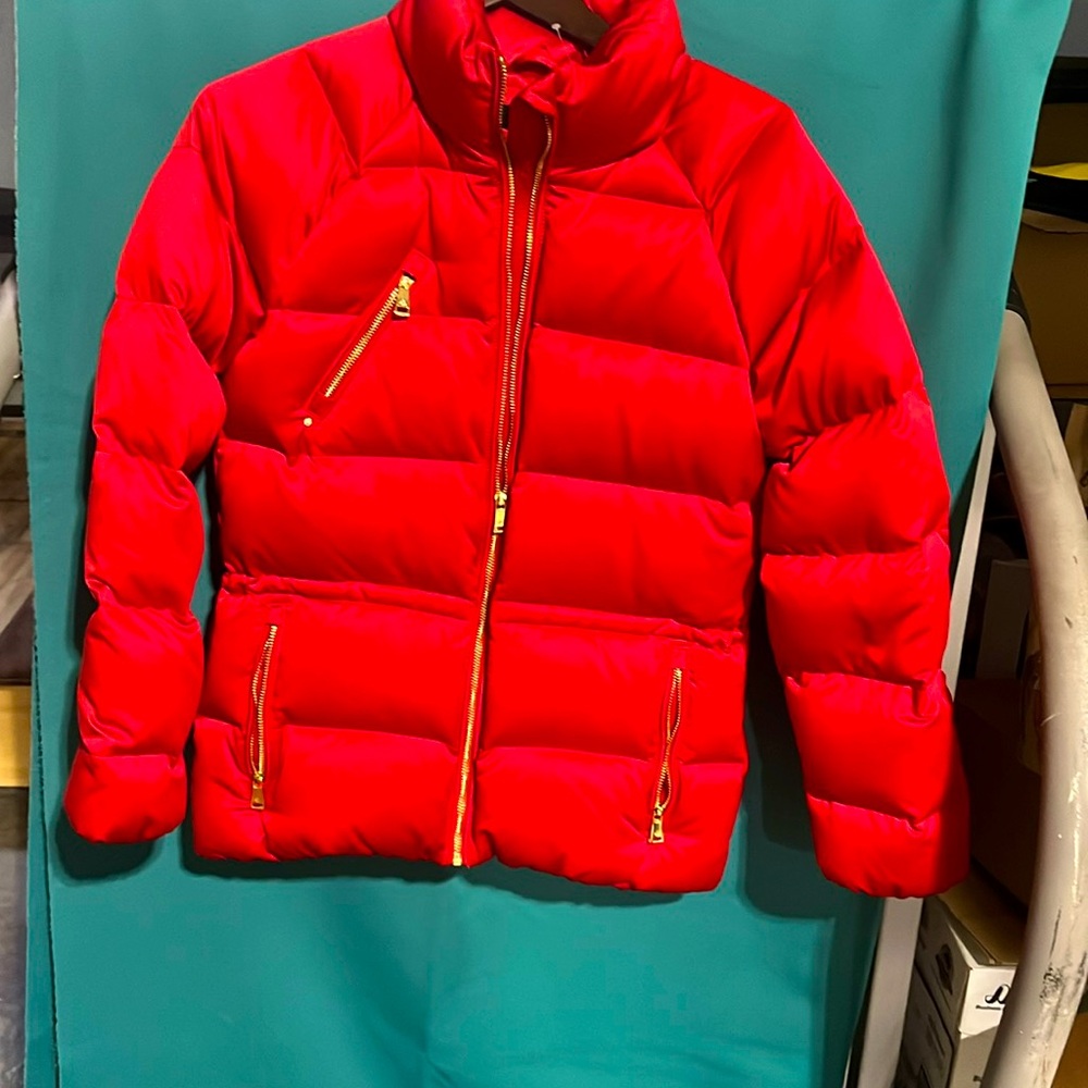 Red puffy jacket great for skiing